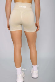 Beige seamless gym shorts – back view, lightweight, breathable, and stylish.