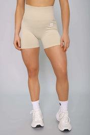 Beige scrunch gym shorts – front view, squat-proof and comfortable for training.