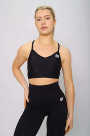 Black sports bra, with removable cups, front view