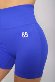 Blue bum scrunch gym shorts – side view, scrunch bum design enhances fit and shape.