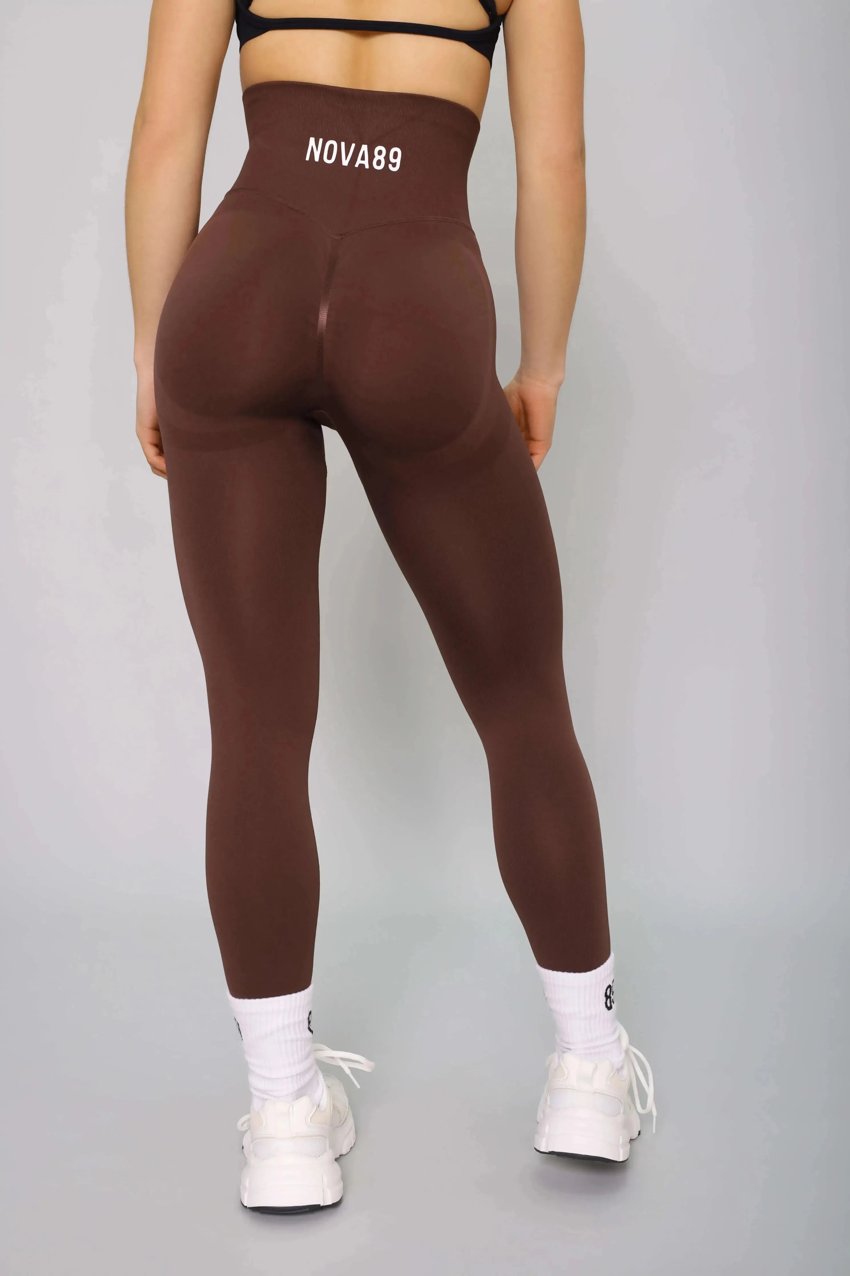 Brown high-waisted fitness leggings – back view, moisture-wicking and breathable
