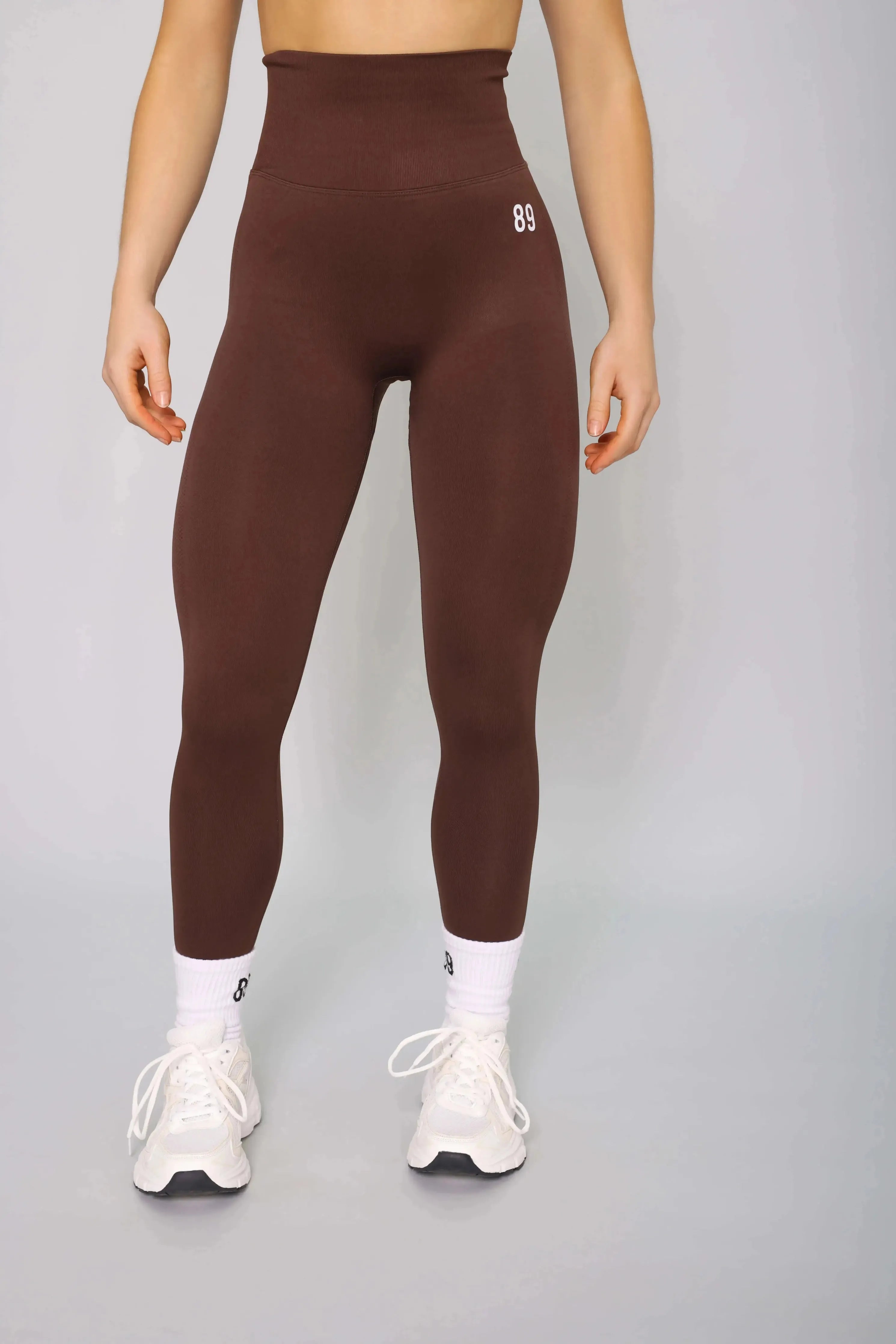 Brown high-waisted fitness leggings – front view, squat-proof and seamless for gym workouts