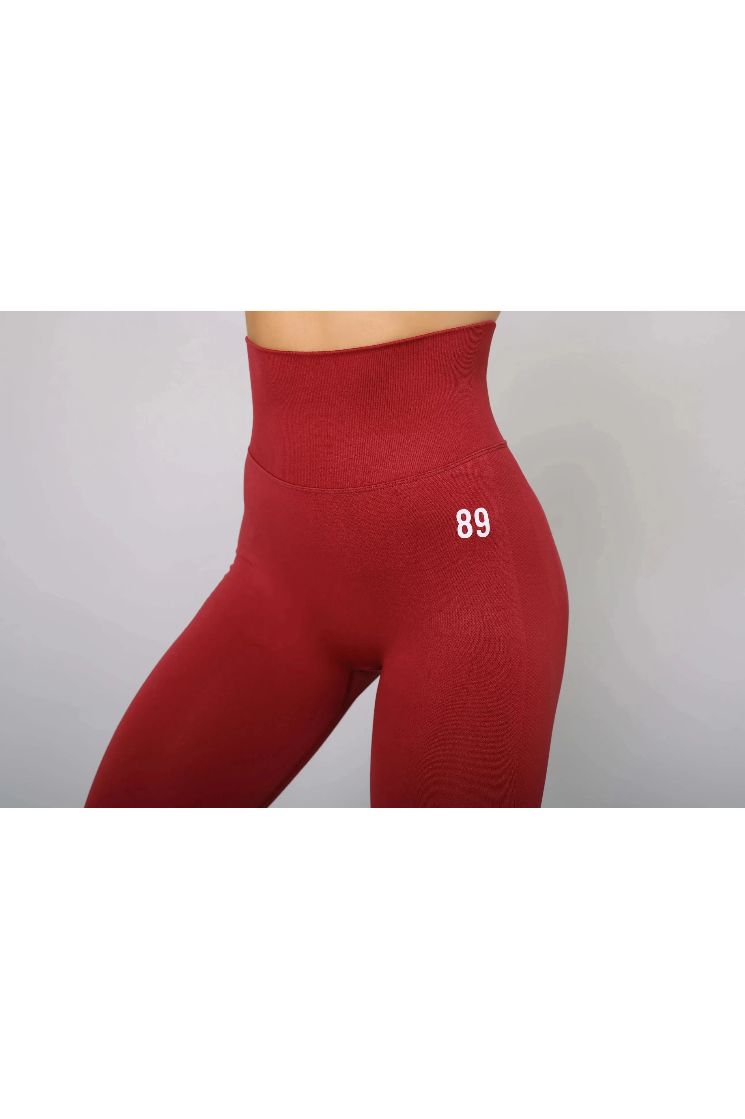 Burgundy seamless fitness leggings – side view, high-waisted and designed for fitness
