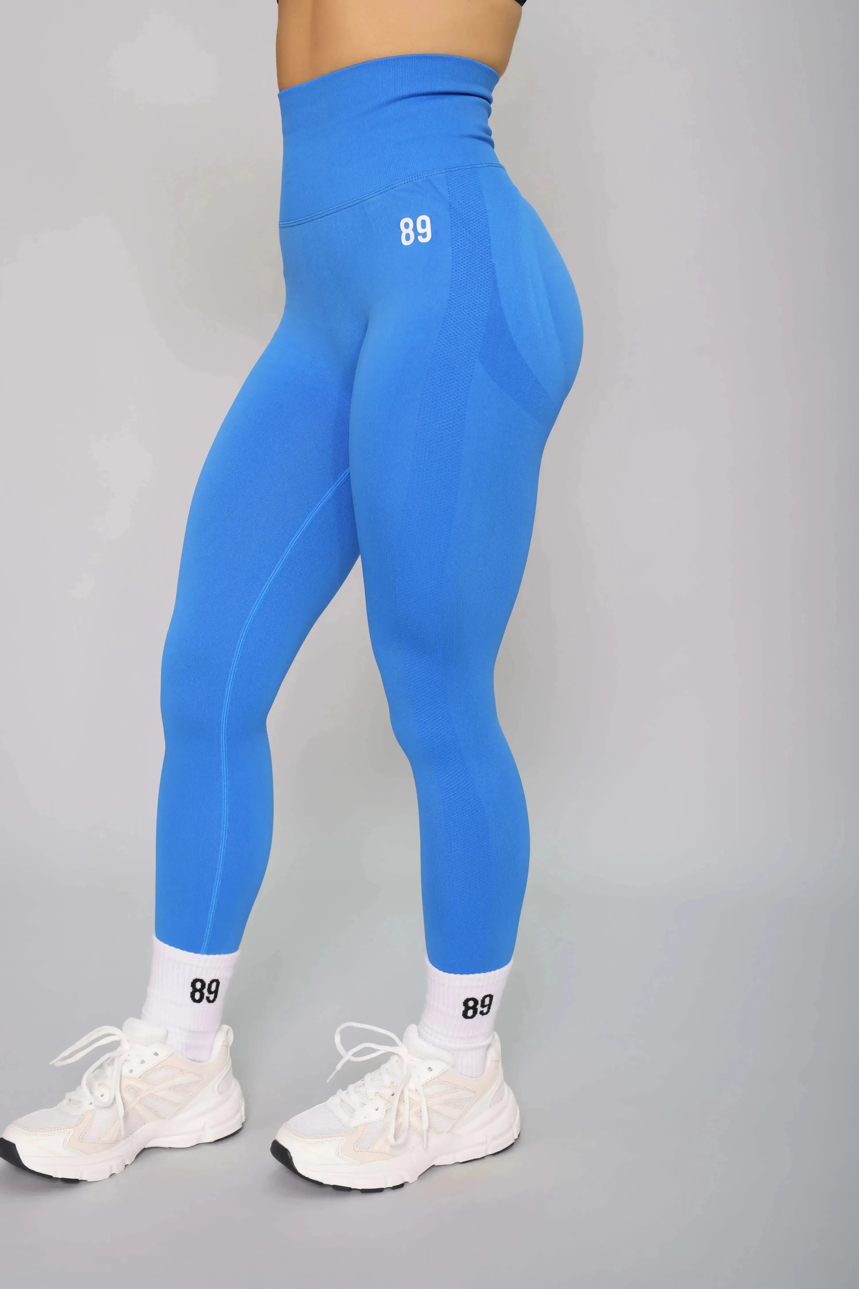 Electric blue squat-proof leggings – side view, perfect for gym workouts and yoga