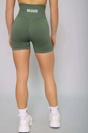 Green seamless gym shorts – back view,  soft, flexible, and perfect for any workout.