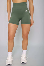 Green scrunch gym shorts – squat-proof and stylish for activewear, front view.