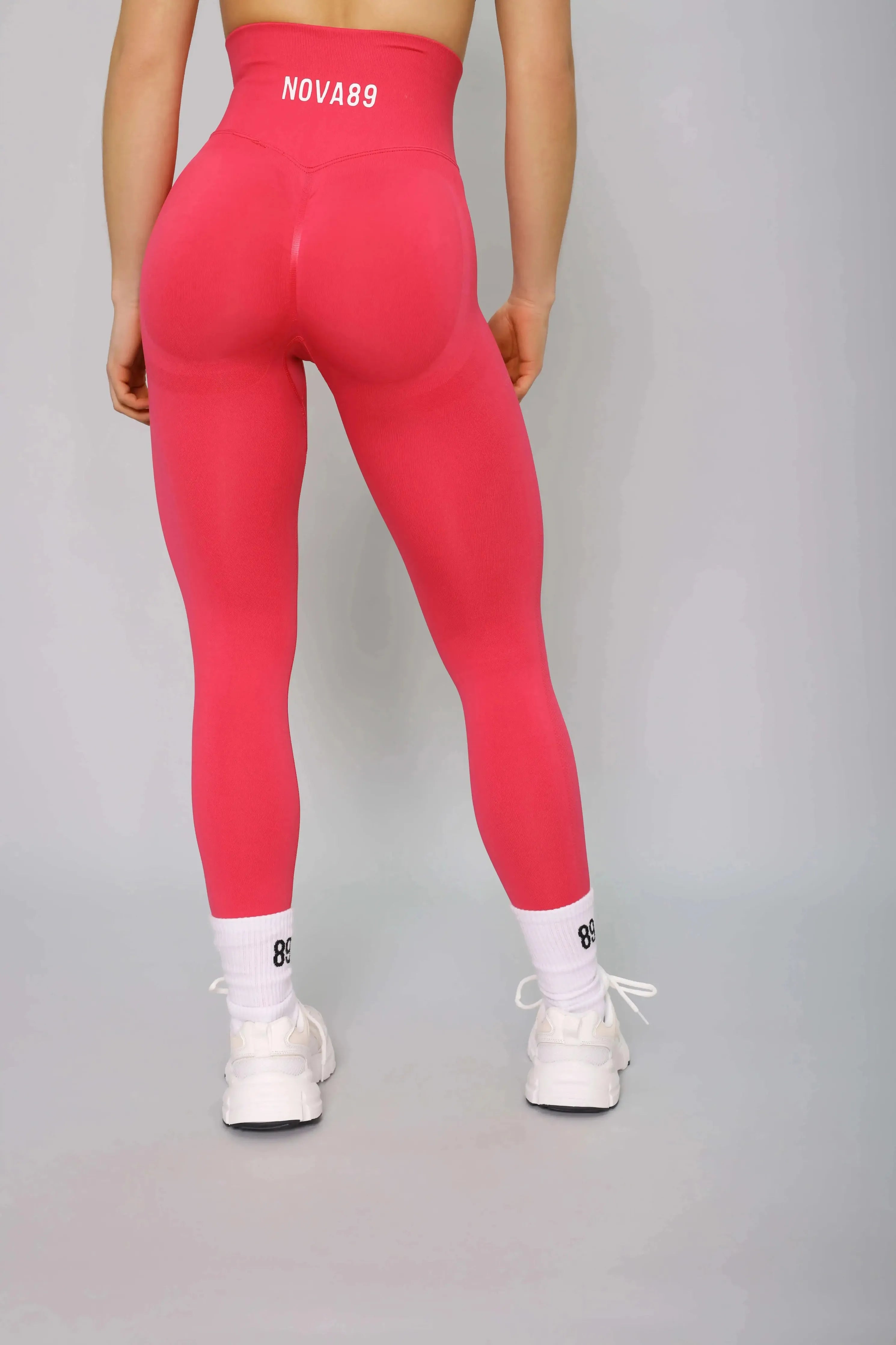 Hot pink squat-proof leggings – back view, designed for comfort and fitness