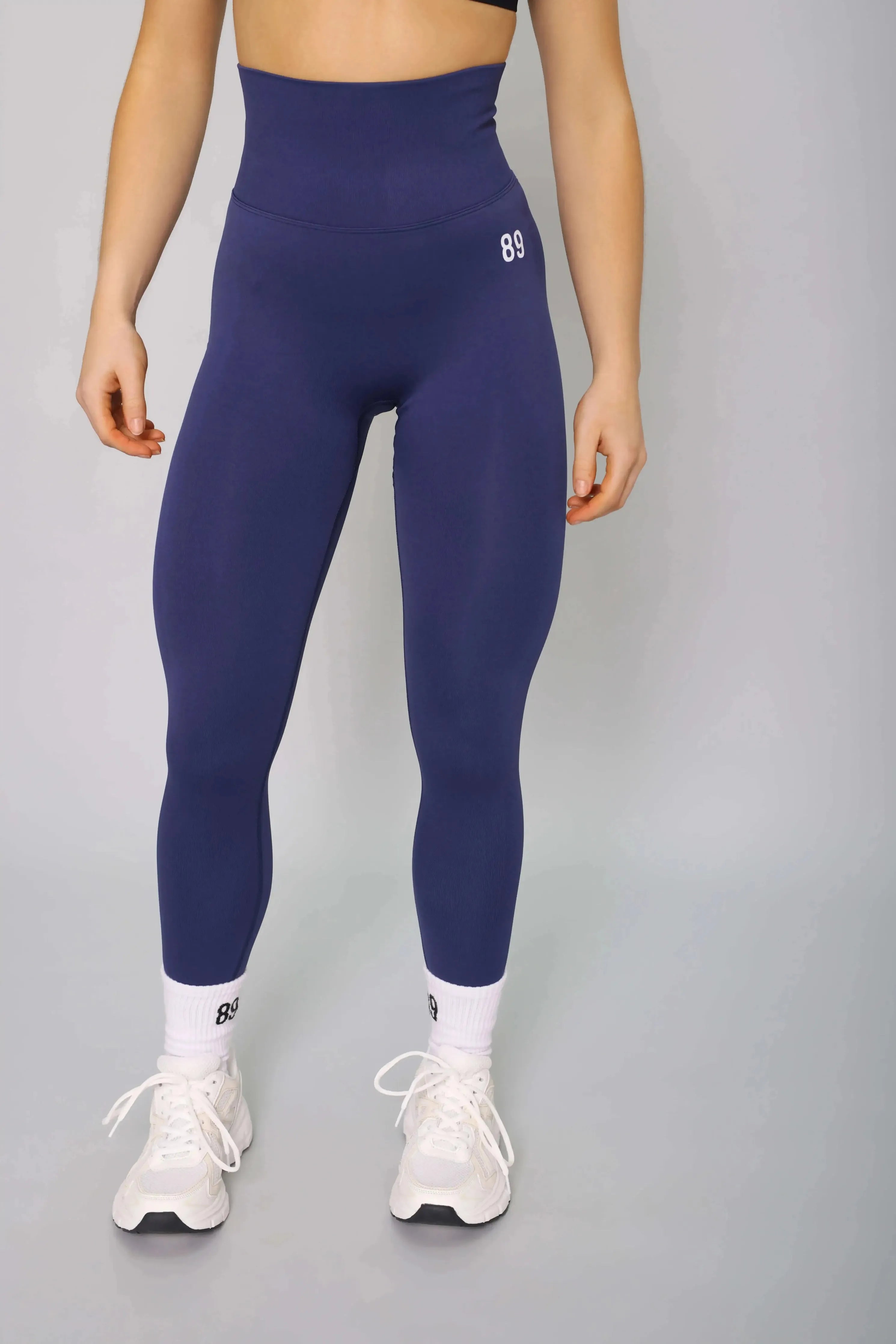 Navy blue tummy control leggings – front view, breathable and squat-proof for gym workouts