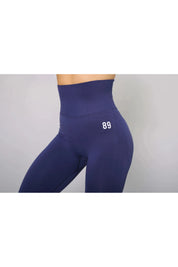 Navy blue tummy control leggings – side view, high-waisted and perfect for gym workouts