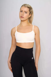 Off white sports bra designed for running, front view