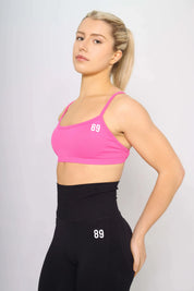 Pink Sports bra for CrossFit, side view, medium support