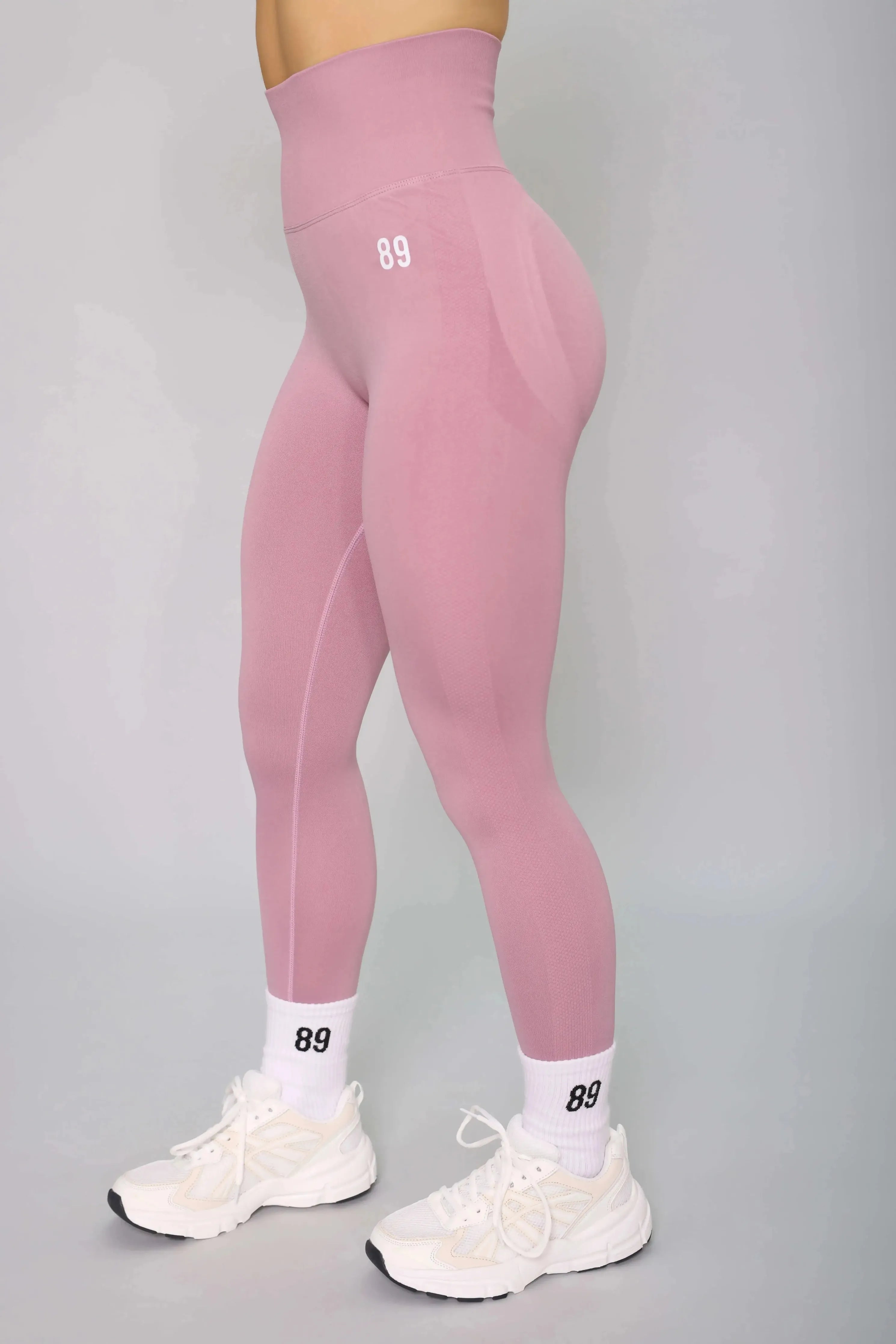 Powder pink scrunch bum leggings – side view, high-waisted and breathable for fitness