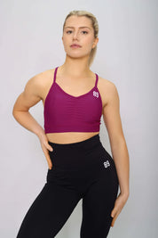 raspberry sports bra, padded with removable cups, front view