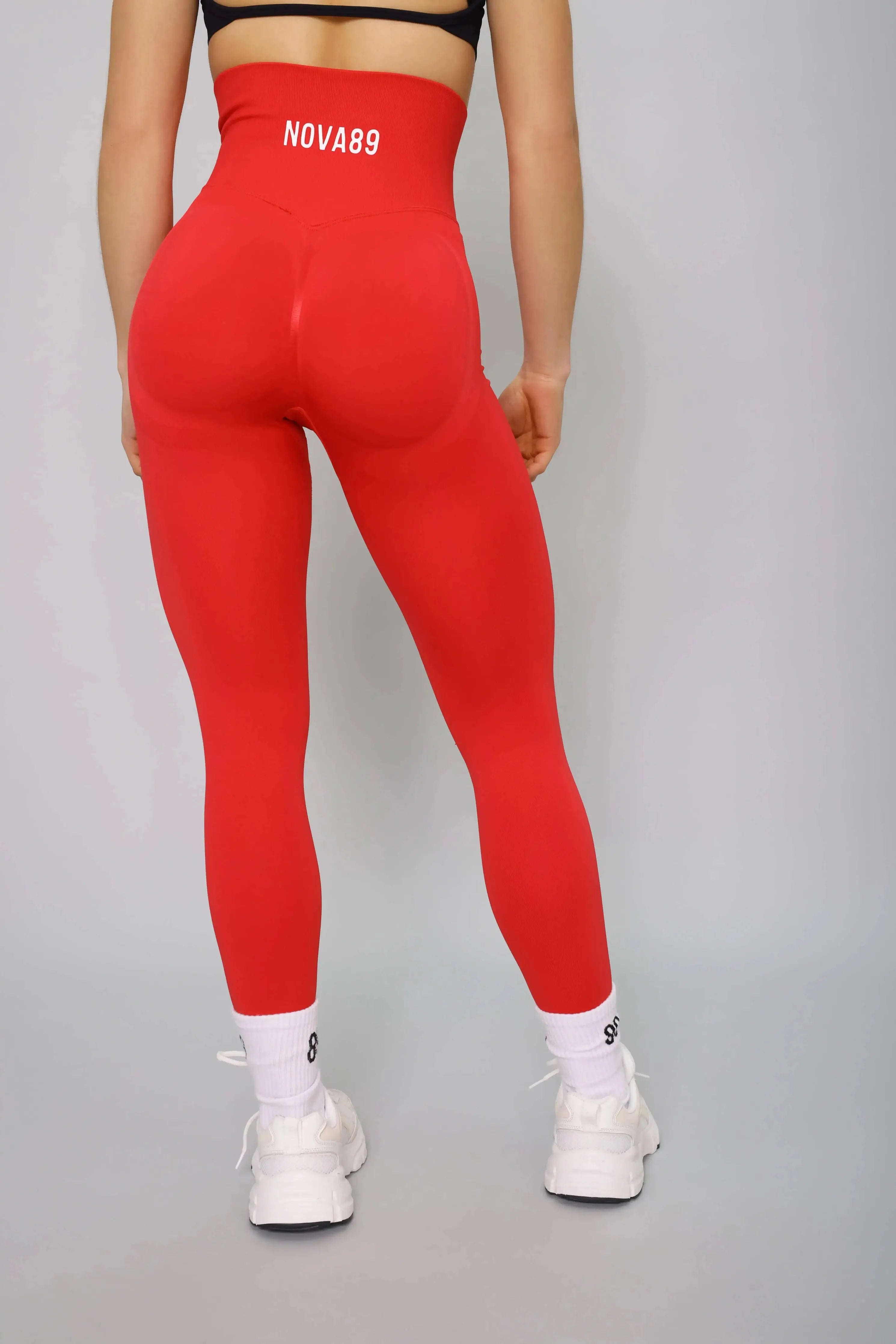 Scarlet red activewear leggings – back view, seamless and squat-proof for exercise