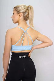 Sky blue sports bra with light support, back view