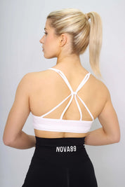 Sports bra in white, light support, back view