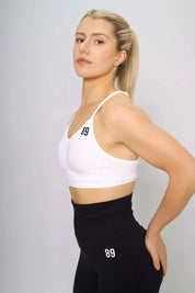 White Sports bra for yoga, side view, medium support